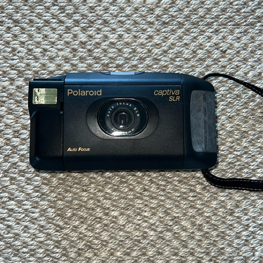 Polaroid 95 film camera captiva auto focus SLR